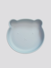Load image into Gallery viewer, Grey blue silicone plate, with suction cup base, in the shape of a bear&#39;s face.
