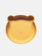 Load image into Gallery viewer, Mustard yellow silicone plate, with suction cup base, in the shape of a bear&#39;s face.
