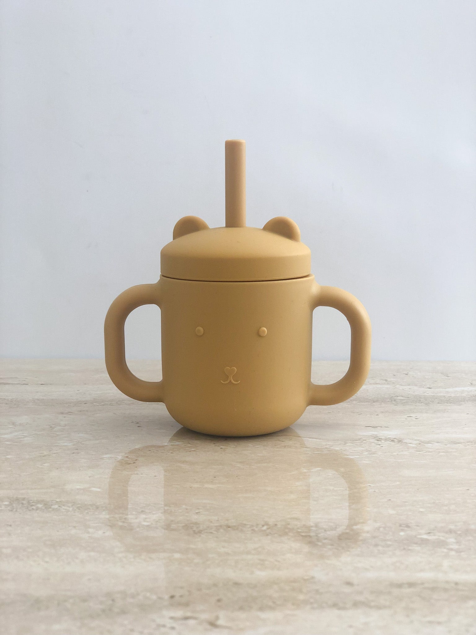 http://thelittlespruce.ca/cdn/shop/products/The-Little-Spruce-Silicone-Baby-Bear-Sippy-Cup-Mustard-Yellow.jpg?v=1649384099