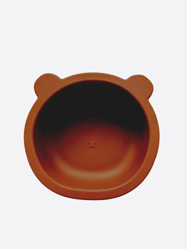 Clay / brown coloured silicone bowl, with suction cup base, in the shape of a bear's face.