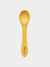 Charger l&#39;image dans la galerie, A small mustard yellow silicone spoon meant for use by babies and toddlers.
