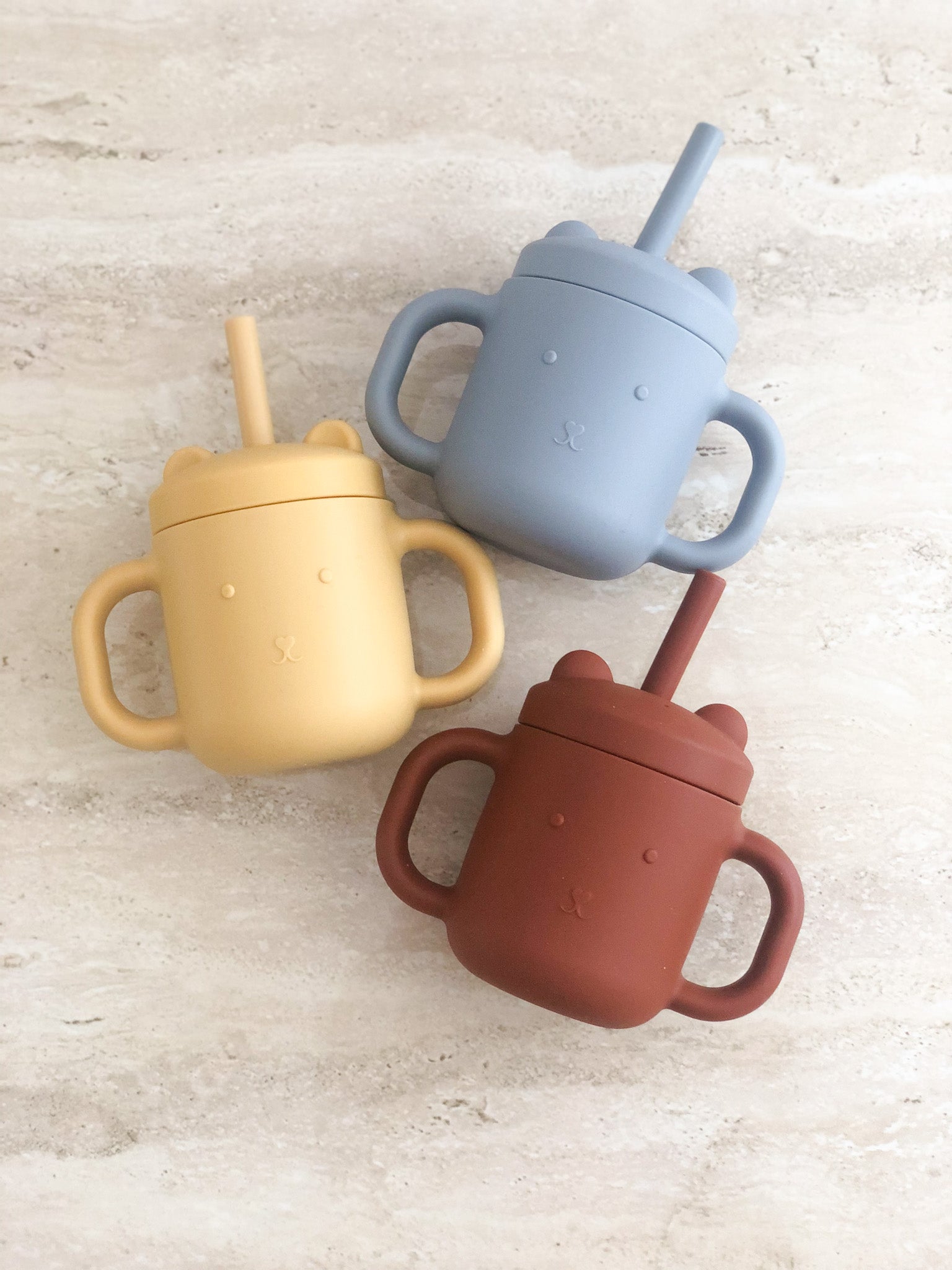 https://thelittlespruce.ca/cdn/shop/products/The-Little-Spruce-Silicone-Baby-Bear-Sippy-Cups-Yellow-Gray-Brown-2_00b51040-2837-4cee-bc4d-75aeafefffc4_1024x1024@2x.jpg?v=1649384103