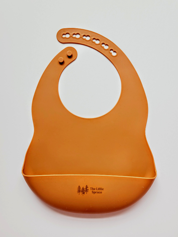 The Little Spruce silicone baby bib, campfire