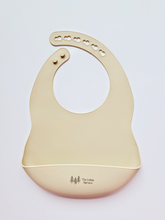Load image into Gallery viewer, The Little Spruce silicone baby bib, prairie wheat
